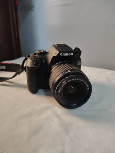 Canon eos 2000 D used ( with it's lens and accessories)