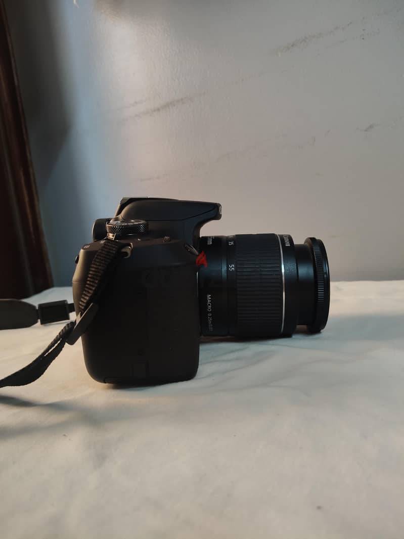 Canon eos 2000 D used ( with it's lens and accessories) 4
