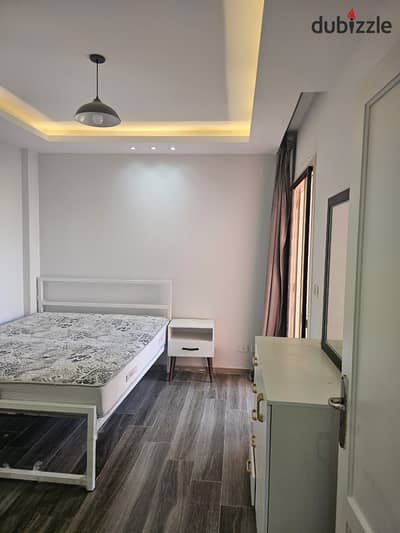For sale in Al Rehab City, a 90m² apartment in Phase 1, super deluxe finishing, 3 bedrooms, 1 bathroom, third floor, wide garden view.