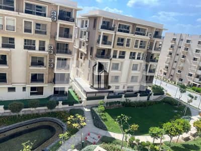 شقه تمليك فيو مباشرة على الـ View landscape تقسيط فى كمبوند تاج سيتي Taj City داخل Orgami التجمع الخامس