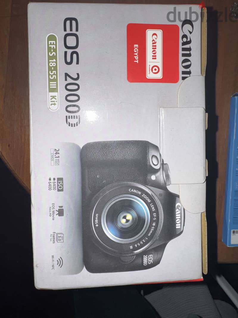 Camera EOS 2000 D with cover and memory card 6