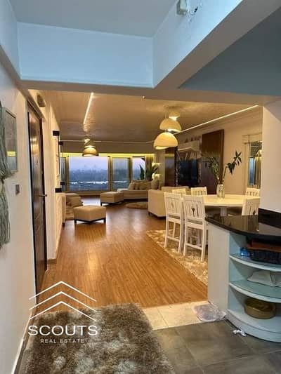 Apartment for sale in Maadi on the Corniche, fully furnished, reve du nil, prime location, Hilton Maadi, a true investment.