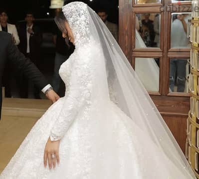 فستان زفاف من اسلام التركى بالفاتورة ٢٥٠٠٠