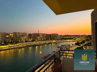 110 sqm chalet for sale at Marina, North Coast, featuring a sea-facing view. Down payment of 500,000 EGP with a 10-year installment plan. Located at M