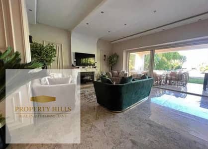 Ground Floor Apartment with Garden for Sale Ready to Move Installments up to 8 Years in Golden Square Distinctive Pool View 5th Settlement New Cairo