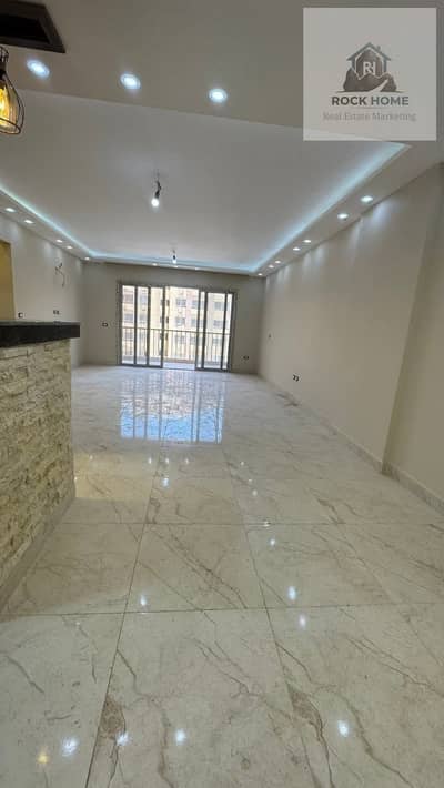 Apartment for rent in Tajaan Compound 2, Zahra Al-Maadi with a landscape view and kitchen.