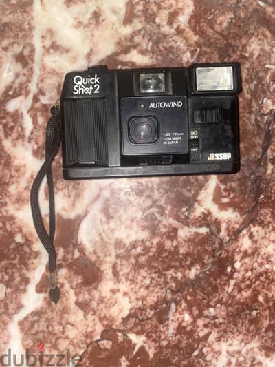 Camera AUTO WIND 1.3. 5 F35mm lens made in japan كاميرا اوتويند