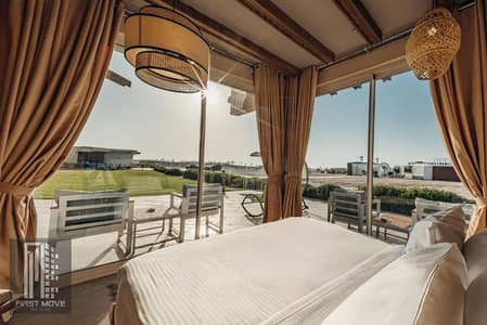 Luxury chalet with ultra-super-luxurious finishing, lagoon view, in the Ras El Hekma area of ​​the North Coast next to June Sodic and Cali Coast
