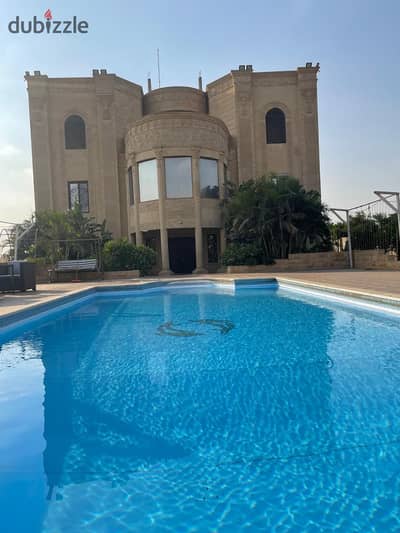 Palace for sale, 6000 sqm, hotel finish, includes all amenities, has a private swimming pool, private garden, car garage in Cairo, Al Obour, Line 10 in a very distinguished location