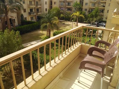 Fully furnished, fully air-conditioned apartment for rent in the Al-Mostaqbal complex, Sheikh Zayed; features a prime location and a wonderful garden