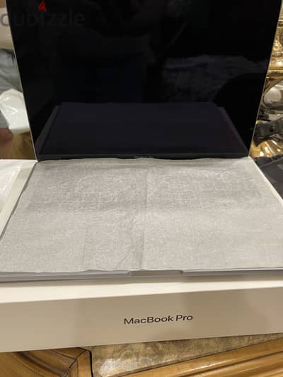 Macbook M1 pro with zero scratches Like brand new and 50 cycle count