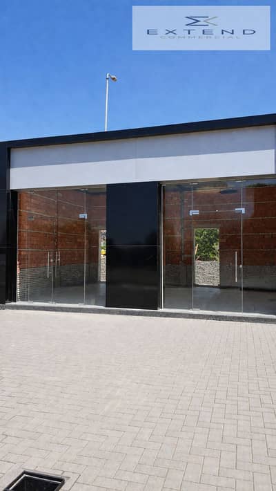 Restaurant for rent 25m in October Gardens with outdoor space and a prime location near the Italian district road amidst residential clusters and expansion areas