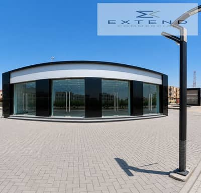 Vital site in October Gardens, a library for rent amid residential clusters and continuous customer activity
