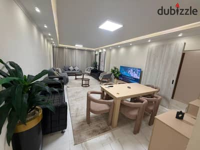 Apartment for sale in One Katameya Compound by Memaar Al Morshedy, furnished, equipped with appliances and air conditioning, and includes a parking sp