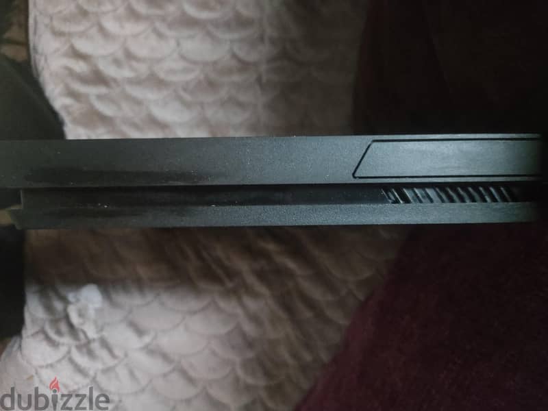 play station 4 slim 7