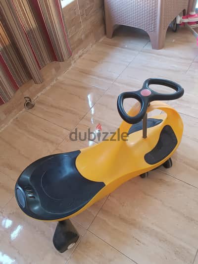 عربية أطفال وايجل كار صفراء بحالة جيدة