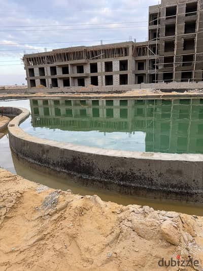 In New Zayed, a 250 sqm twin house villa for sale in De Joya Compound next to SODIC – developed by Taj Misr Developments