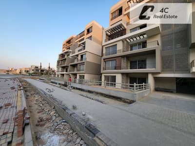 Ready to move north-facing garden apartment with down payment and installments resale below developer price in Palm Hills New Cairo near Golden Square