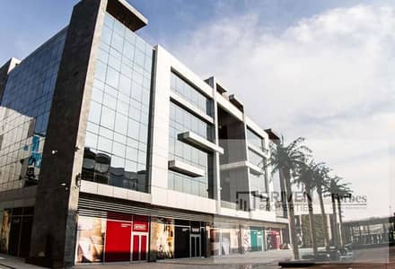 Fully finished clinic with air conditioning for rent in Twin Towers Sheikh Zayed directly on the 26th of July Axis