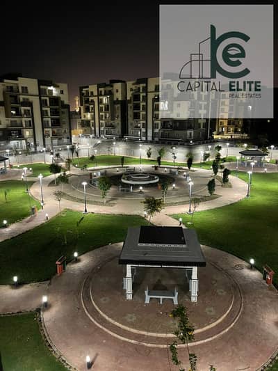 Apartment for rent, 140 sqm, located on a typical floor. It is a corner unit overlooking a large garden within the Dar Misr Al-Qaranful compound, oppo