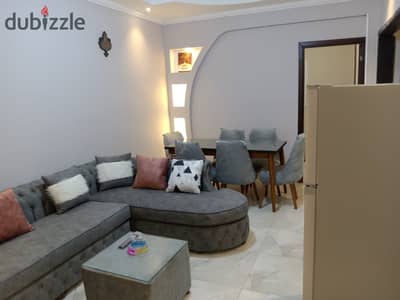 For rent directly from the owner, a furnished apartment on Main Manial Street, the first building on Manial Street, 3 rooms and 2 bathrooms, fully ready. Preferably for a yearly lease for a school year at a price of 35,000 EGP, or monthly for 40,000 EGP, or daily for 2,500 EGP.