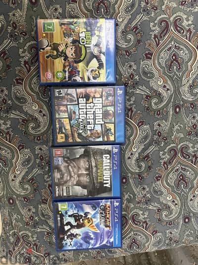 Gta cd- call of duty cd- ratchet clank cd- ben 10 CD