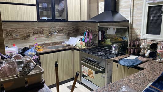 مطبخ خشمونيوم