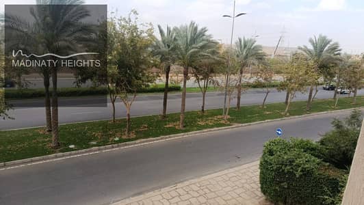 Apartment for rent in Madinaty B1  bedroom bathroom reception kitchen  second floor  open view  equipped with air conditioning  prime location next to services, metro, market, medical center, and just steps away from Arabesque Mall, open air, and gates