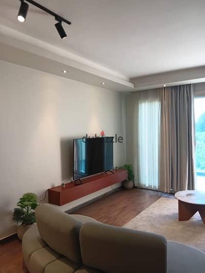 Apartment with a large area, modern furniture, and special finishes in the Duset Lake View compound