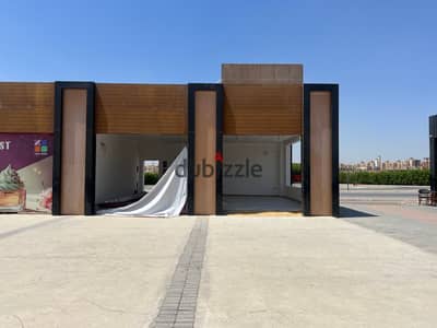 محل تجاري للإيجار في مول Zee Hub – طريق الواحات | 90م داخلي + 84م خارجى