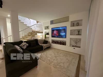 Luxury 400 sqm townhouse for rent in Mivida (Emaar); features a distinctive layout and an open view. Ready for immediate occupancy,