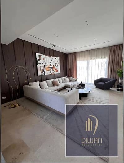 Ready-to-move apartment with landscape view in Creek Town, New Cairo. Minutes from AUC and Madinaty, with a big cash discount.