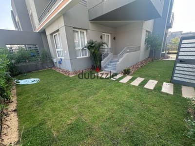 Apartment for sale on the ground with a private garden in Kayan compound inside Grand Heights compound