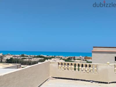 شالية روف روعة برؤية كاملة للبحر بقرية الروضة السياحية الساحل الشمالى