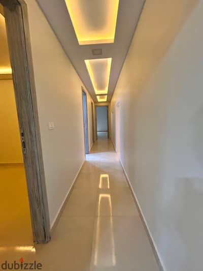 250m apartment for sale with garden in villas south of the Academy, New Cairo