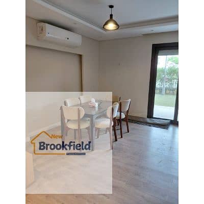 شقه ارضى بحديقه للايجار مفروش فى كمبوند ديستريكت 5 القاهرة الجديدة  Fully Furnished Ground Floor Apartment with Private Garden for Rent in District5