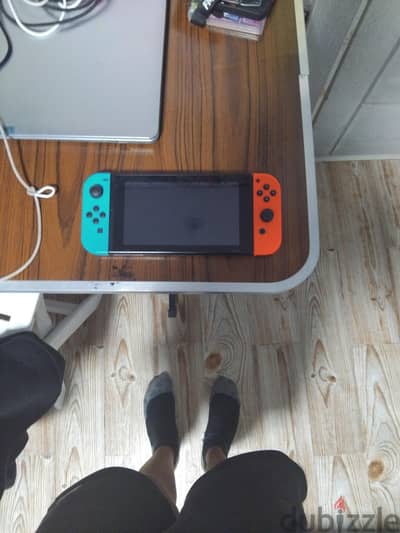 Nintendo Switch Console (Neon Blue & Neon Red Joy-Con)