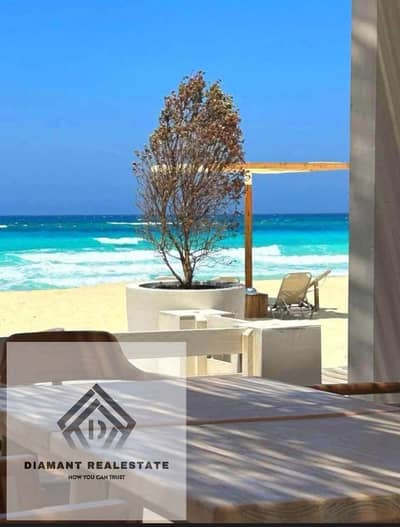 Chalet for sale in North Coast 60m Finished with hotel services and Panoramic sea view, at Special price and installments Over 15Years