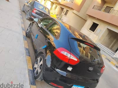 كيا ريو 2015 اعلى فئه فتحة سقف وبصمه فابريكة بالكامل