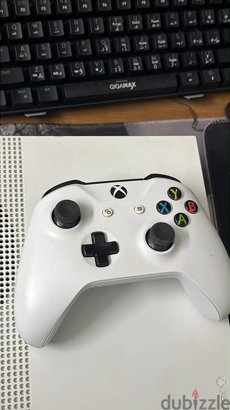 Xbox one s  With 5 games 1