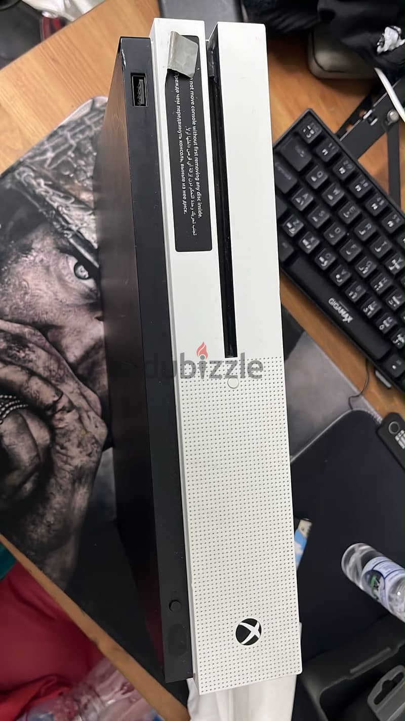 Xbox one s  With 5 games 4