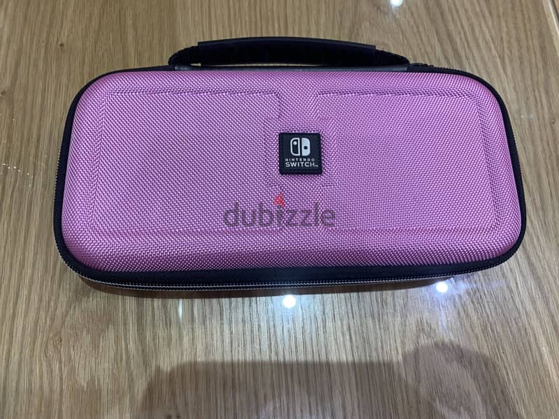 Nintendo switch lite in very good condition 6