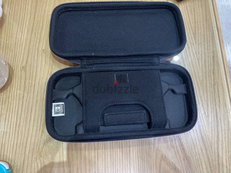 Nintendo switch lite in very good condition 7