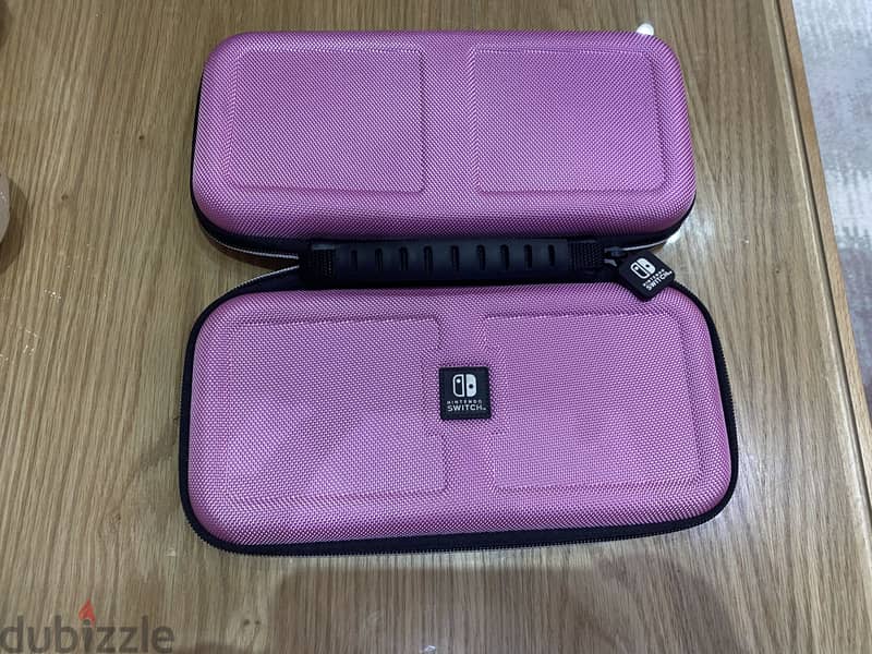 Nintendo switch lite in very good condition 8