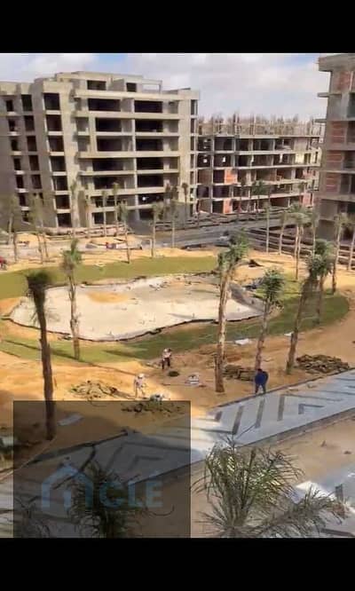 A Luxury Semi-finished apartment with a stunning pool view is for sale at a special price in Al Patio Oro Compound, BUA : 200 sqm , 3 beds and 3 baths