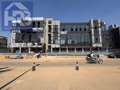 Ground floor shop, mall front, immediate delivery in First Settlement, a vibrant and residential area between 9 and 10, purple