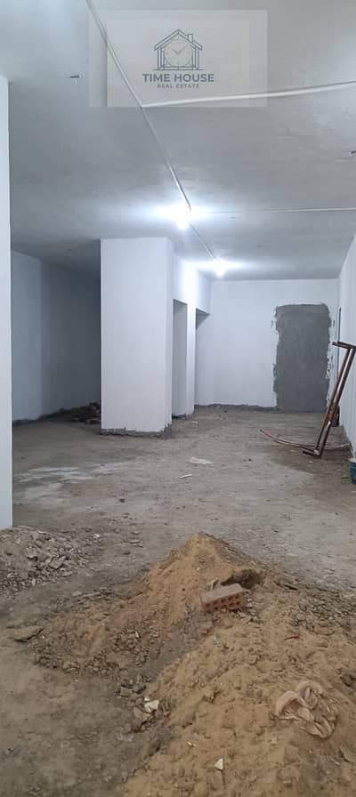 Rent a store on Al-Hurriya Main Street with a bathroom, office, and outdoor space