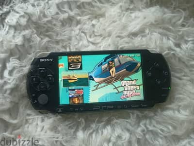 psp 3000 slim +لعبة300 +شاحن 64 جيجا +بطارية