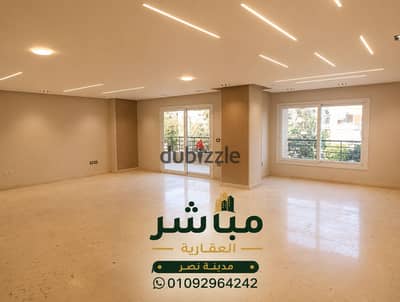 Licensed administrative headquarters for rent 400m – Hassan Al-Ma'moon Al-Raeesi – Nasr City on Hassan Al-Ma'moon Al-Raeesi Street, steps from Abu Dawood Al-Zahiri and Al-Ahly Club, inside a modern building with a hotel entrance