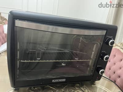 فرن كهربائي BLACK+DECKER TRO66 سعة 66 لتر – حالة ممتاز